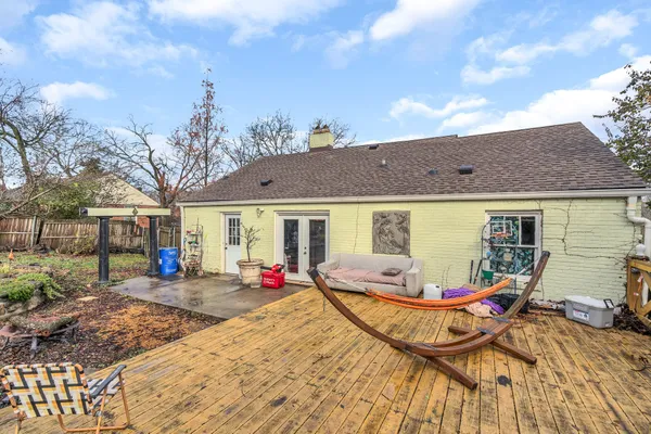 a view of a backyard with large trees