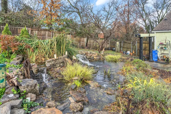 a backyard of a house with lots of green space