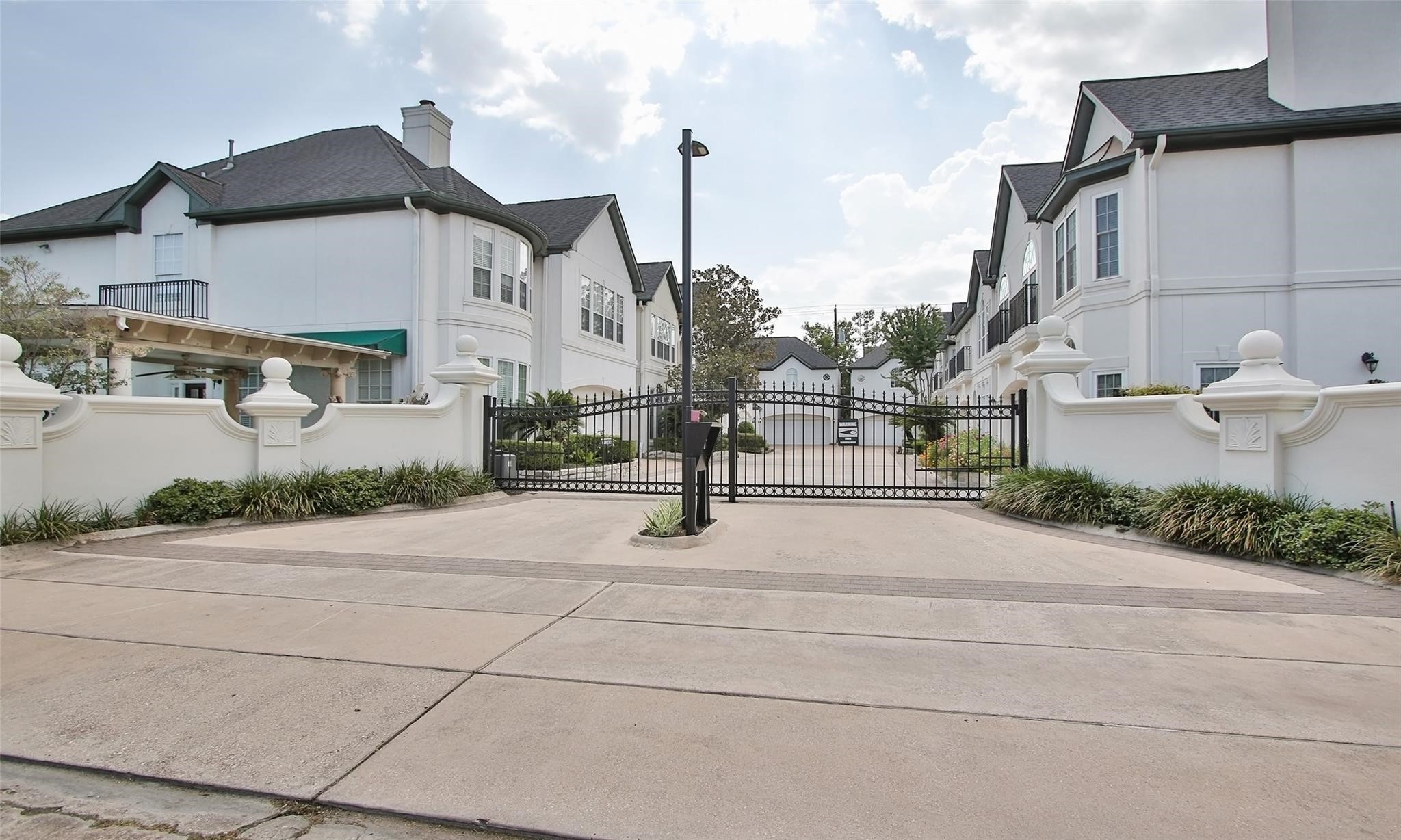2124 Nantucket Drive, Unit B Houston, TX 77057 - Photo 2 of 35 Gated entrance to the 8 homes at 2124 Nantucket