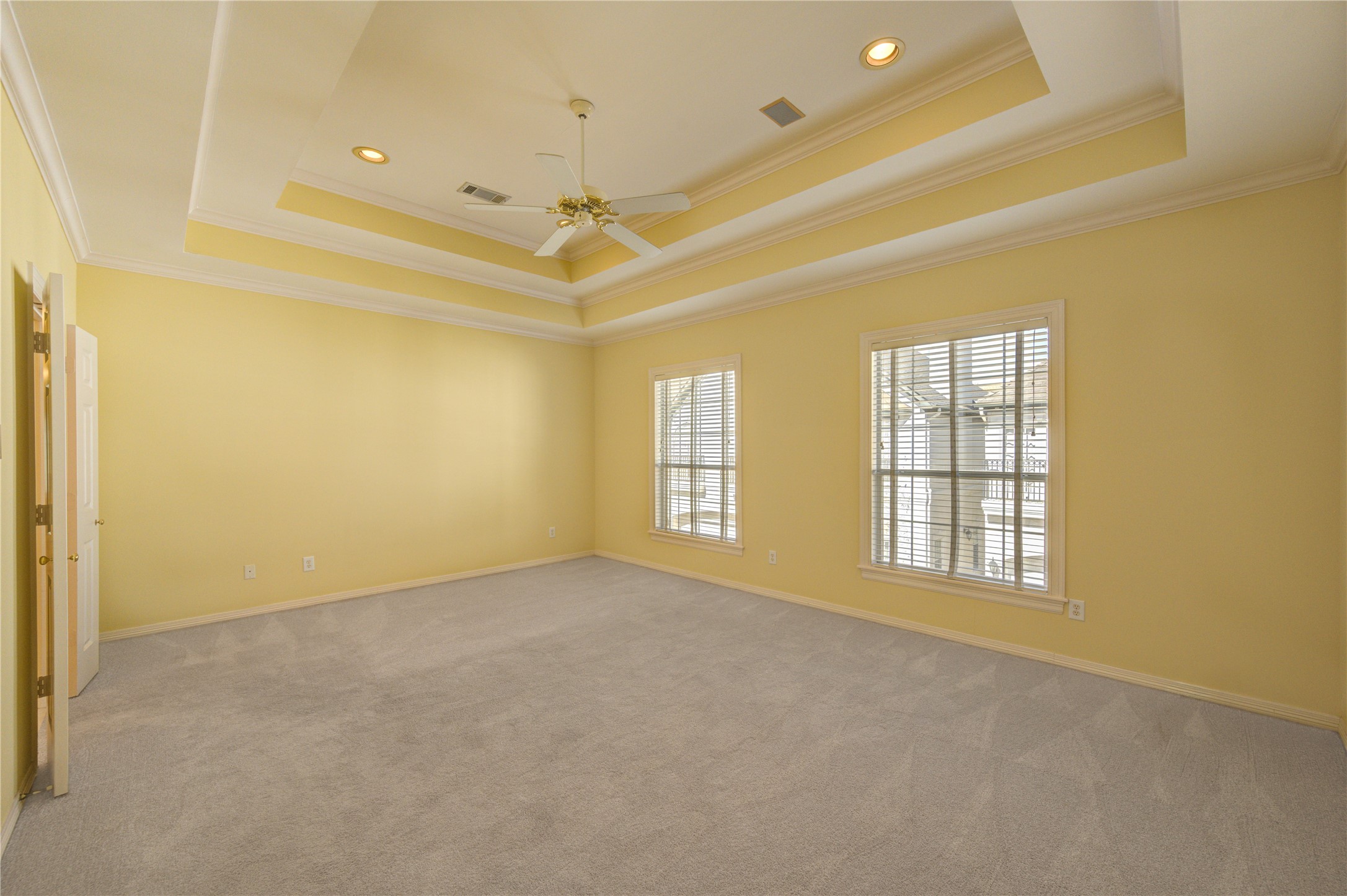 2124 Nantucket Drive, Unit B Houston, TX 77057 - Photo 24 of 35 Primary bedroom with double crown molding.