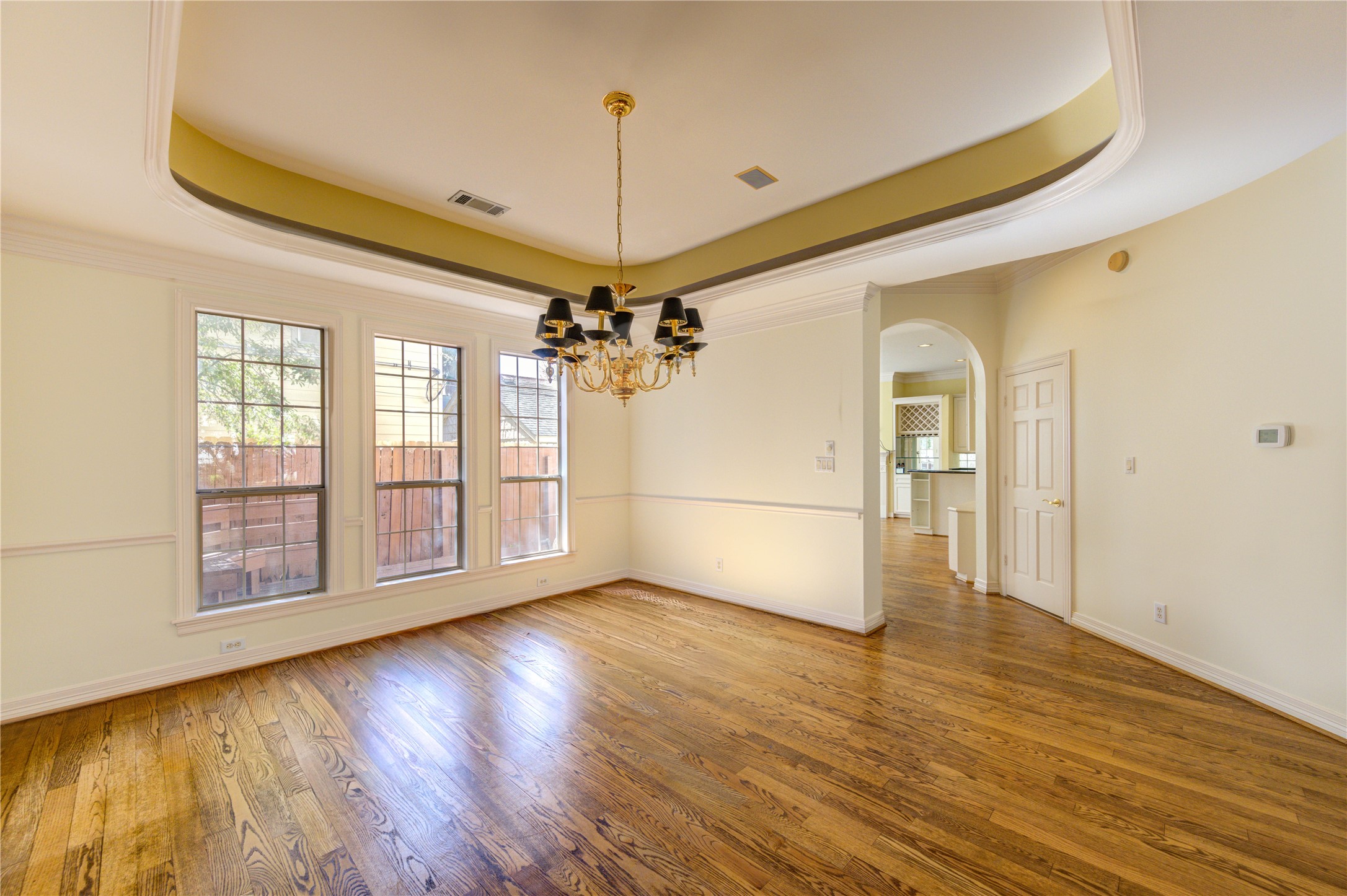 2124 Nantucket Drive, Unit B Houston, TX 77057 - Photo 8 of 35 Dining room features trey ceiling, crown and chair molding