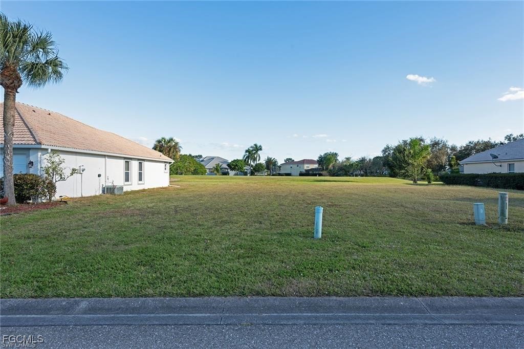 2020 Oxford Ridge Circle Lehigh Acres, FL 33973 - Photo 2 of 4 a house view with outdoor space
