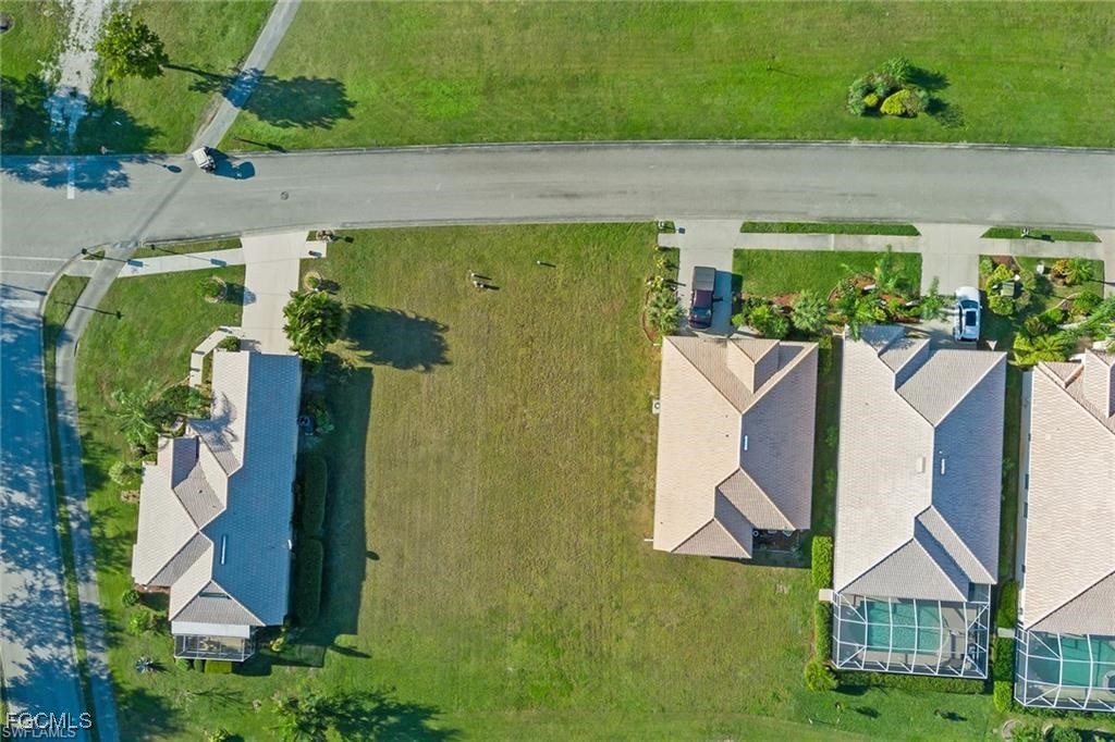 2020 Oxford Ridge Circle Lehigh Acres, FL 33973 - Photo 3 of 4 an aerial view of a house