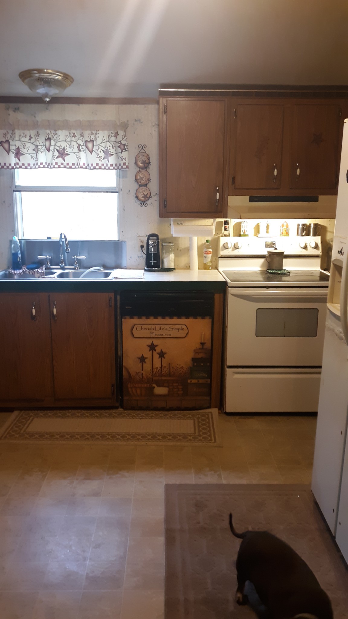 6611 Wesley Ridge Road Lyles, TN 37098 - Photo 11 of 27 a kitchen with a stove and a cabinets