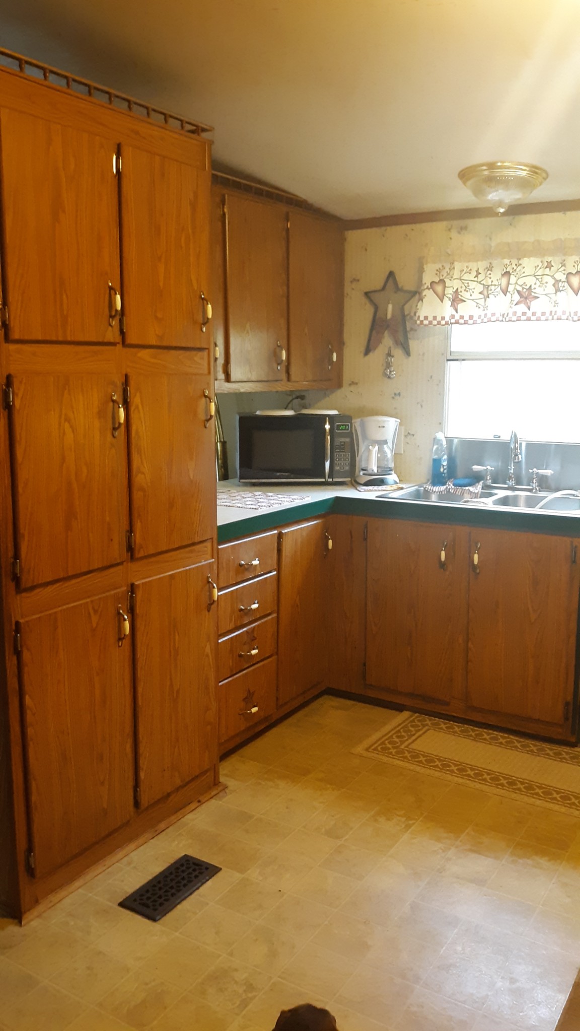 6611 Wesley Ridge Road Lyles, TN 37098 - Photo 10 of 27 a view of a kitchen with wooden floor