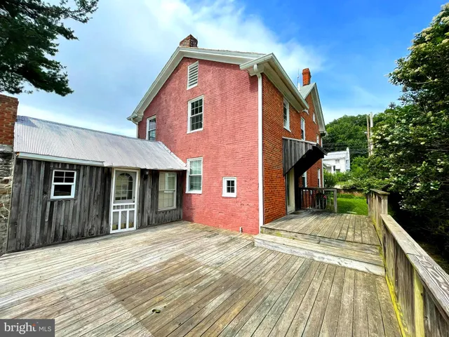 a front view of a house with a porch
