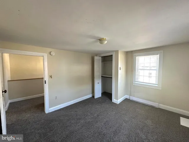 an empty room with an entryway