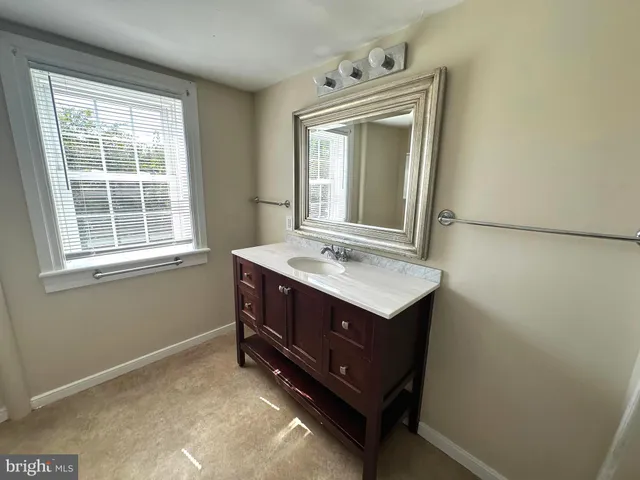 a bathroom with a shower and a tub