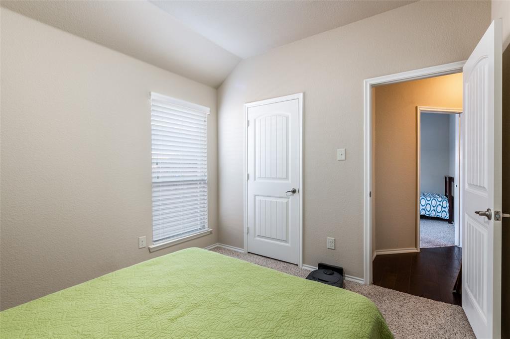 504 Rocky Pine Road McKinney, TX 75072 - Photo 26 of 36 Bedroom featuring carpet floors and lofted ceiling