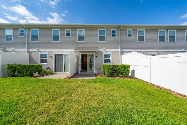 a view of a livingroom with a furniture