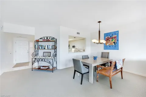 a view of a workspace with furniture