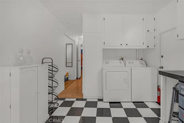 a room with a black white checkered floor and a black white checkered floor