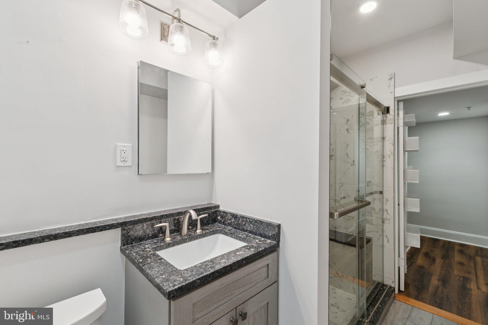 1858 California Street Northwest, Unit 5 Washington, DC 20009 - Photo 23 of 28 Sleek modern bathroom with elegance.