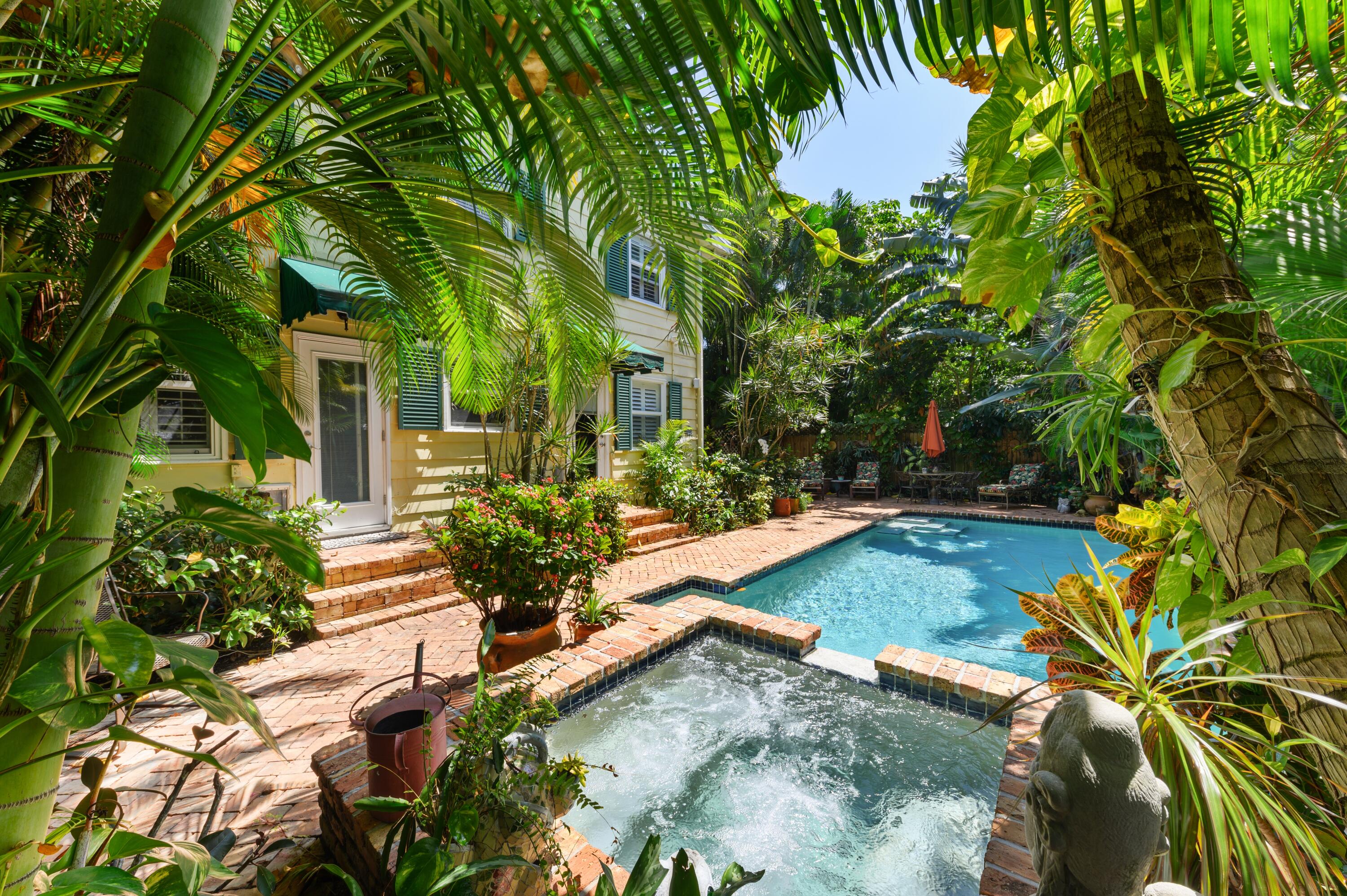 24 Marine Way, Unit 26 Delray Beach, FL 33483 - Photo 15 of 18 a view of a house with swimming pool