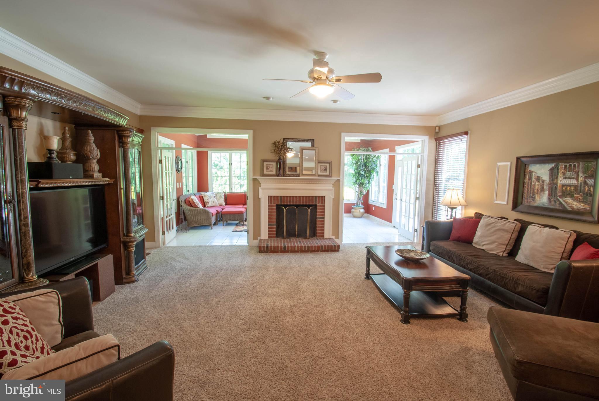 2002 Cortland Road Davidsonville, MD 21035 - Photo 6 of 43 Huge family room w/ fireplace opens to sunroom