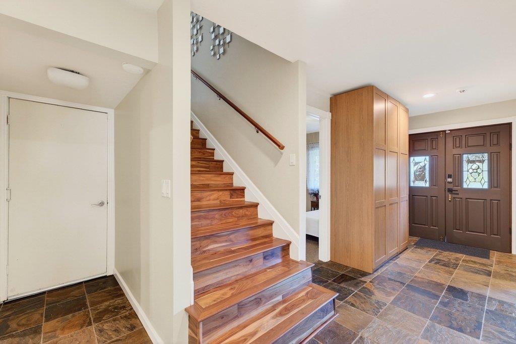 2907 Granite Creek Road Scotts Valley, CA 95066 - Photo 34 of 68 a view of a hallway with entryway and hall with wooden floor
