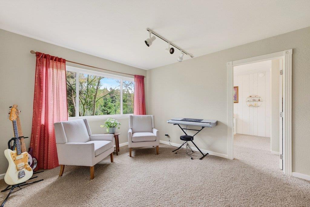 2907 Granite Creek Road Scotts Valley, CA 95066 - Photo 35 of 68 a living room with furniture and a window
