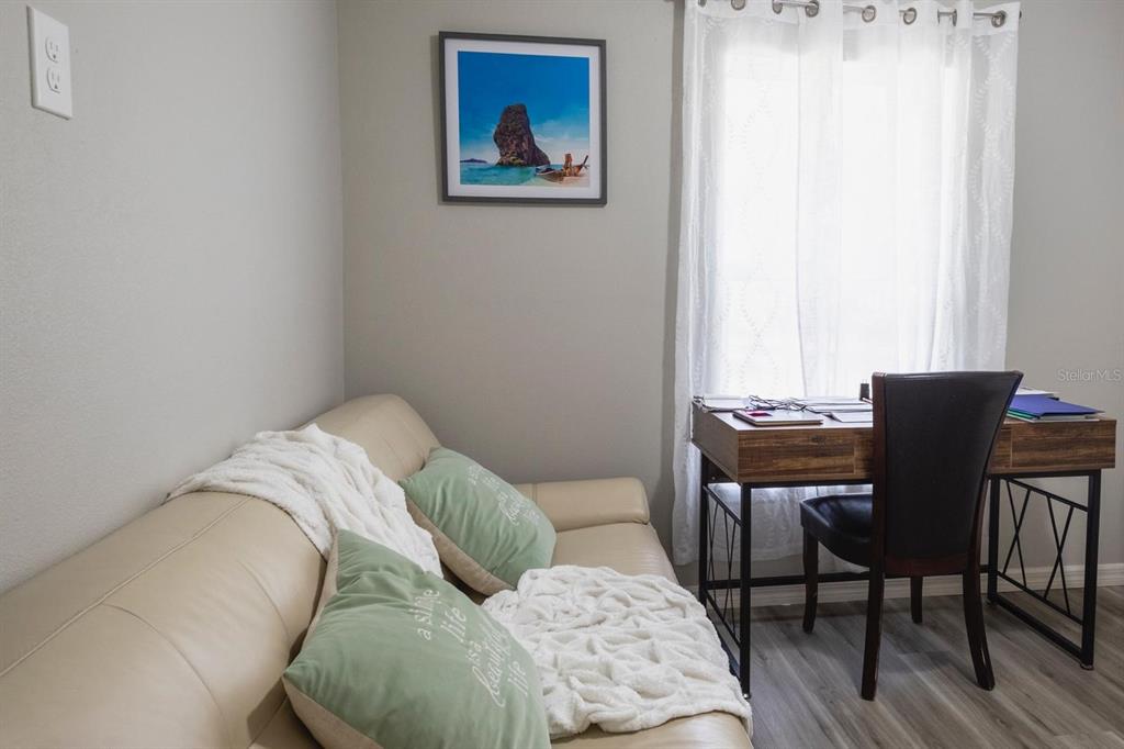 12569 Southwest 73rd Street Ocala, FL 34481 - Photo 14 of 28 a living room with furniture and a window