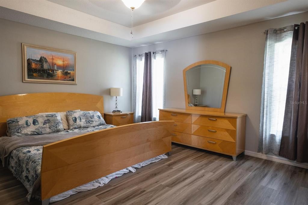 12569 Southwest 73rd Street Ocala, FL 34481 - Photo 16 of 28 a bedroom with bed and window