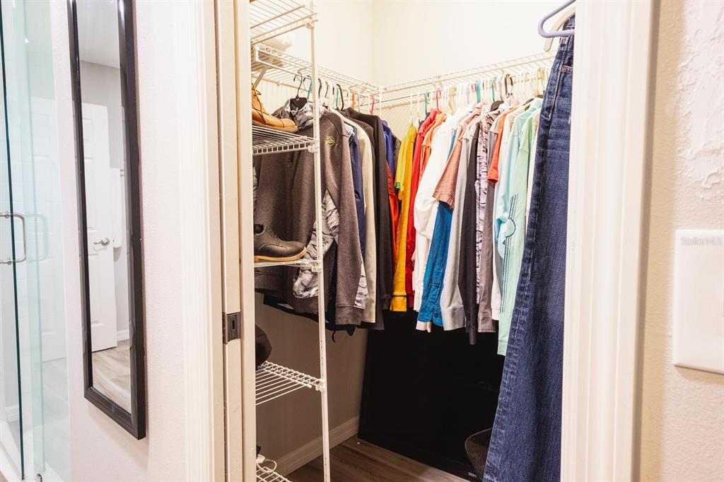 12569 Southwest 73rd Street Ocala, FL 34481 - Photo 19 of 28 a view of walk in closet with clothes