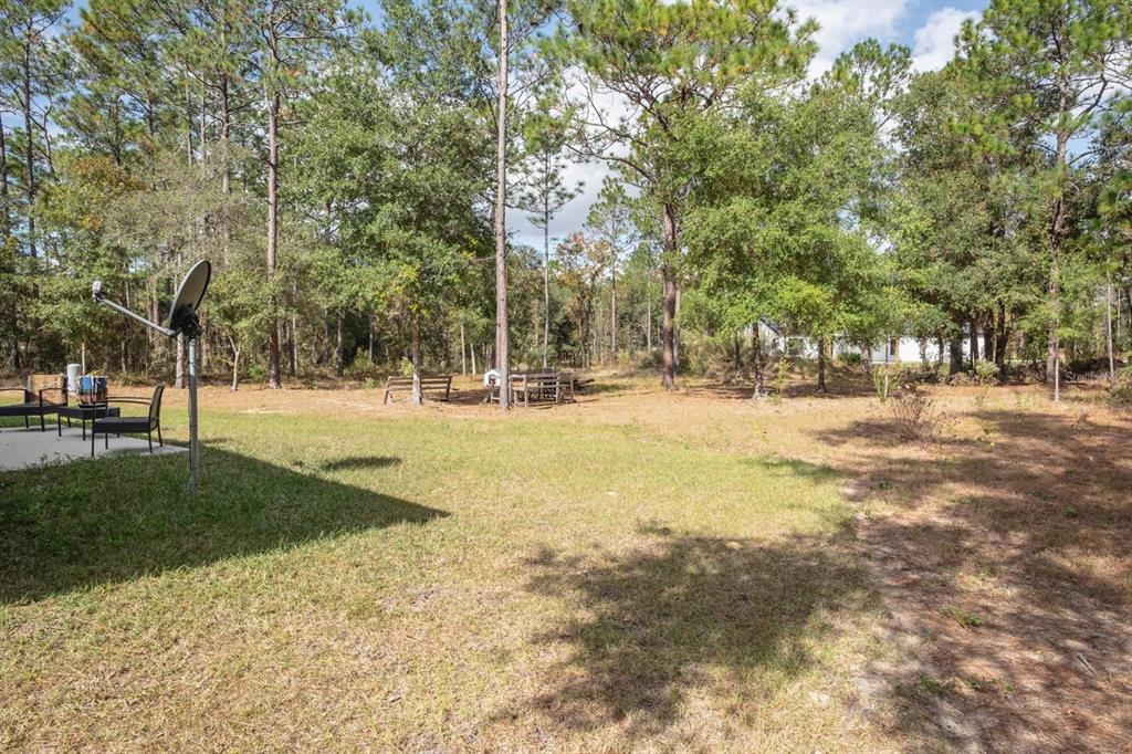 12569 Southwest 73rd Street Ocala, FL 34481 - Photo 25 of 28 a view of road with trees