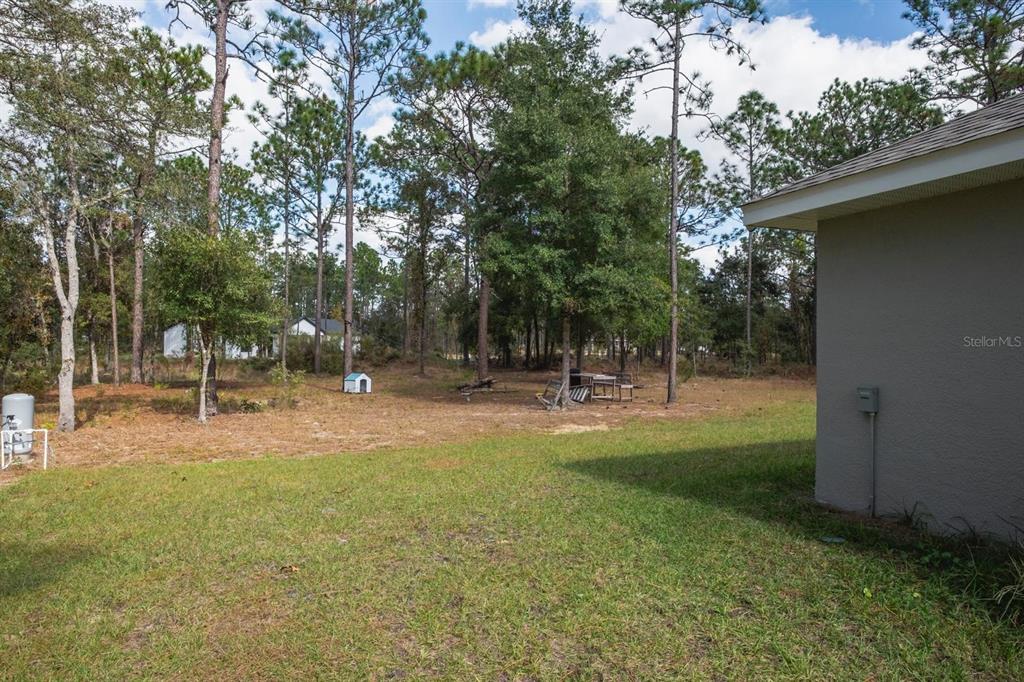 12569 Southwest 73rd Street Ocala, FL 34481 - Photo 26 of 28 a view of a park with swings