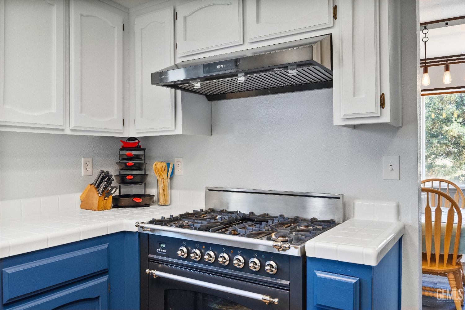 Undisclosed Address Tehachapi, CA 93561 - Photo 17 of 46 a kitchen with stainless steel appliances granite countertop a stove and a cabinets