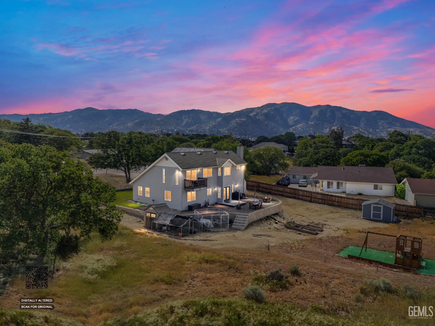Undisclosed Address Tehachapi, CA 93561 - Photo 2 of 46 a view of a town with mountains in the background