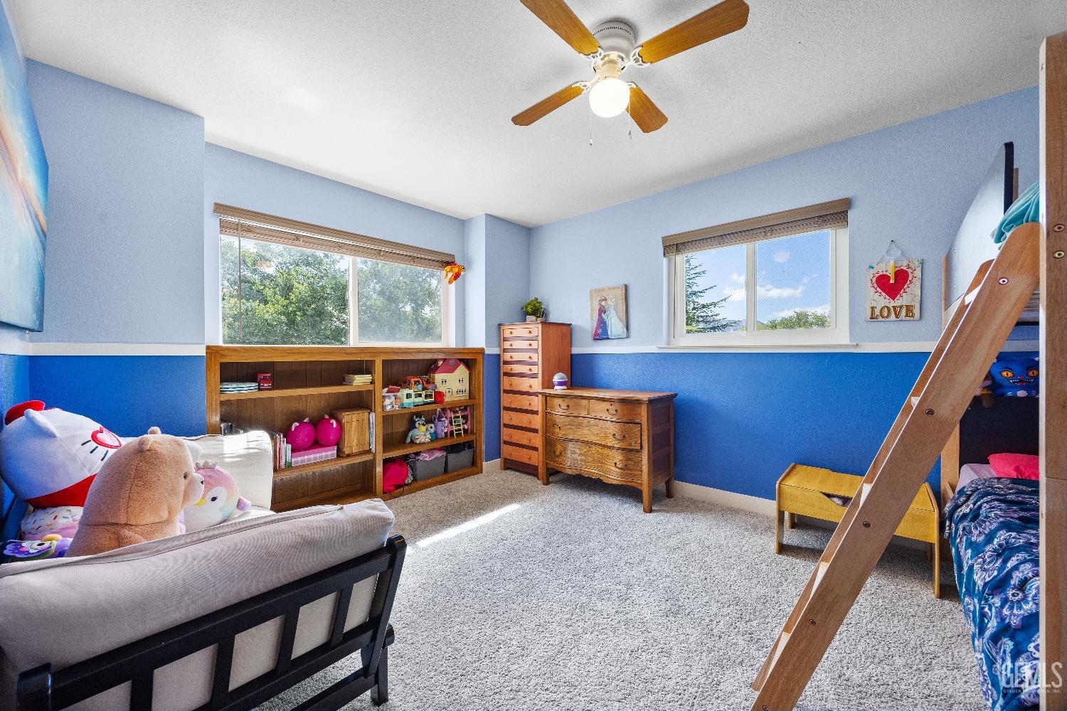 Undisclosed Address Tehachapi, CA 93561 - Photo 27 of 46 a bedroom with furniture and a window