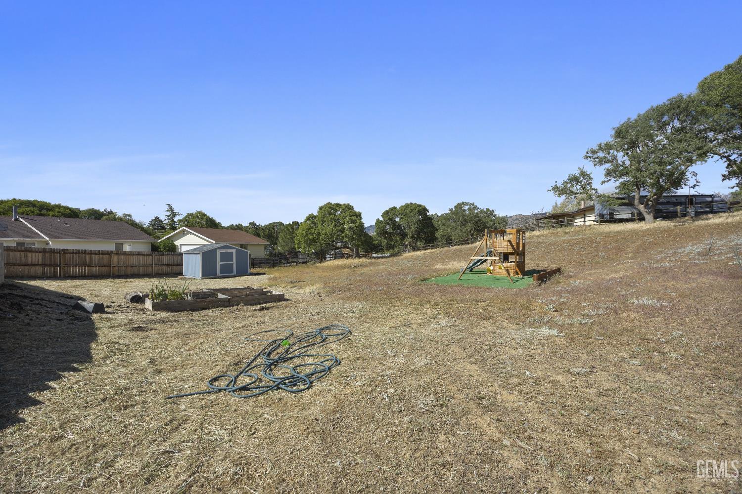 Undisclosed Address Tehachapi, CA 93561 - Photo 44 of 46 a view of a dry yard with wooden fence