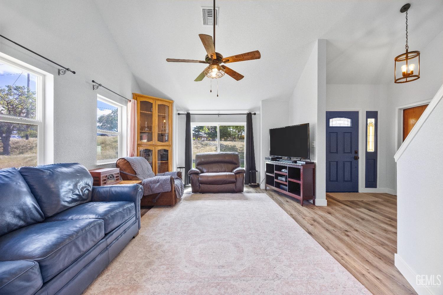 Undisclosed Address Tehachapi, CA 93561 - Photo 6 of 46 a living room with furniture and a flat screen tv