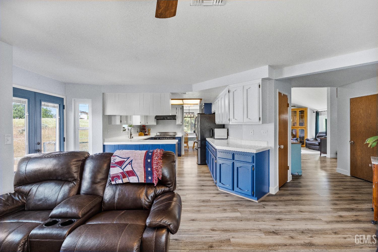 Undisclosed Address Tehachapi, CA 93561 - Photo 10 of 46 a living room with furniture and kitchen view