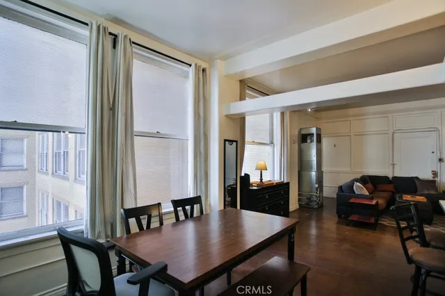 a view of a dining room with furniture