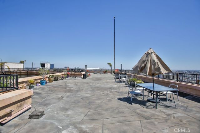 a view of roof deck with seating space
