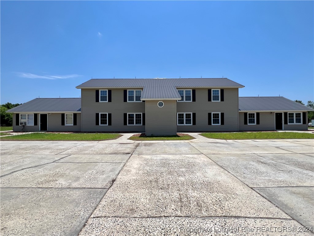1829 Horne Camp Road, Unit 2 Fairmont, NC 28340 - Photo 1 of 18 a view of a house with a big yard