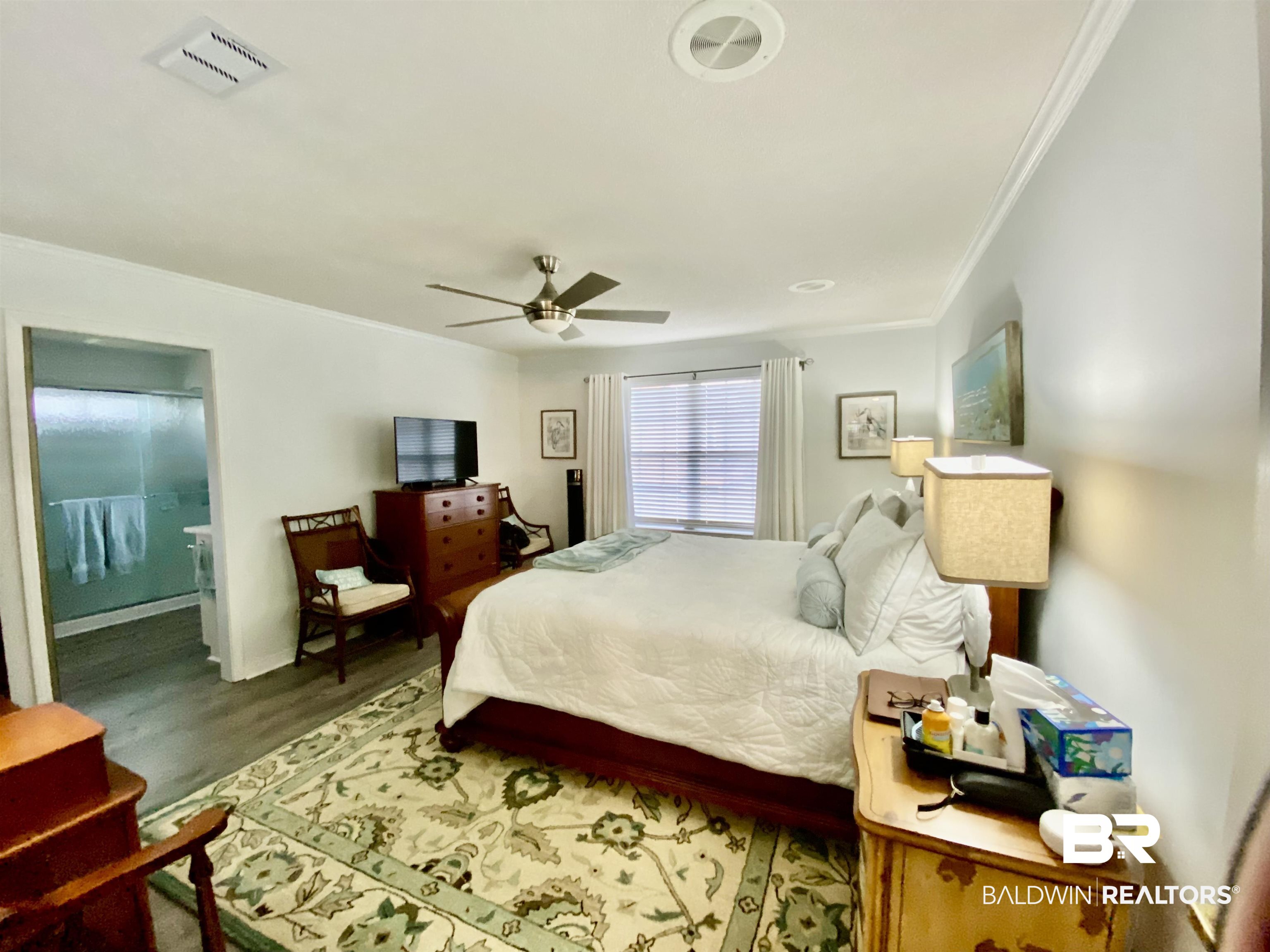 2872 Avenida Alberto Lillian, AL 36549 - Photo 24 of 31 Bedroom featuring ceiling fan, hardwood / wood-style floors, and ornamental molding
