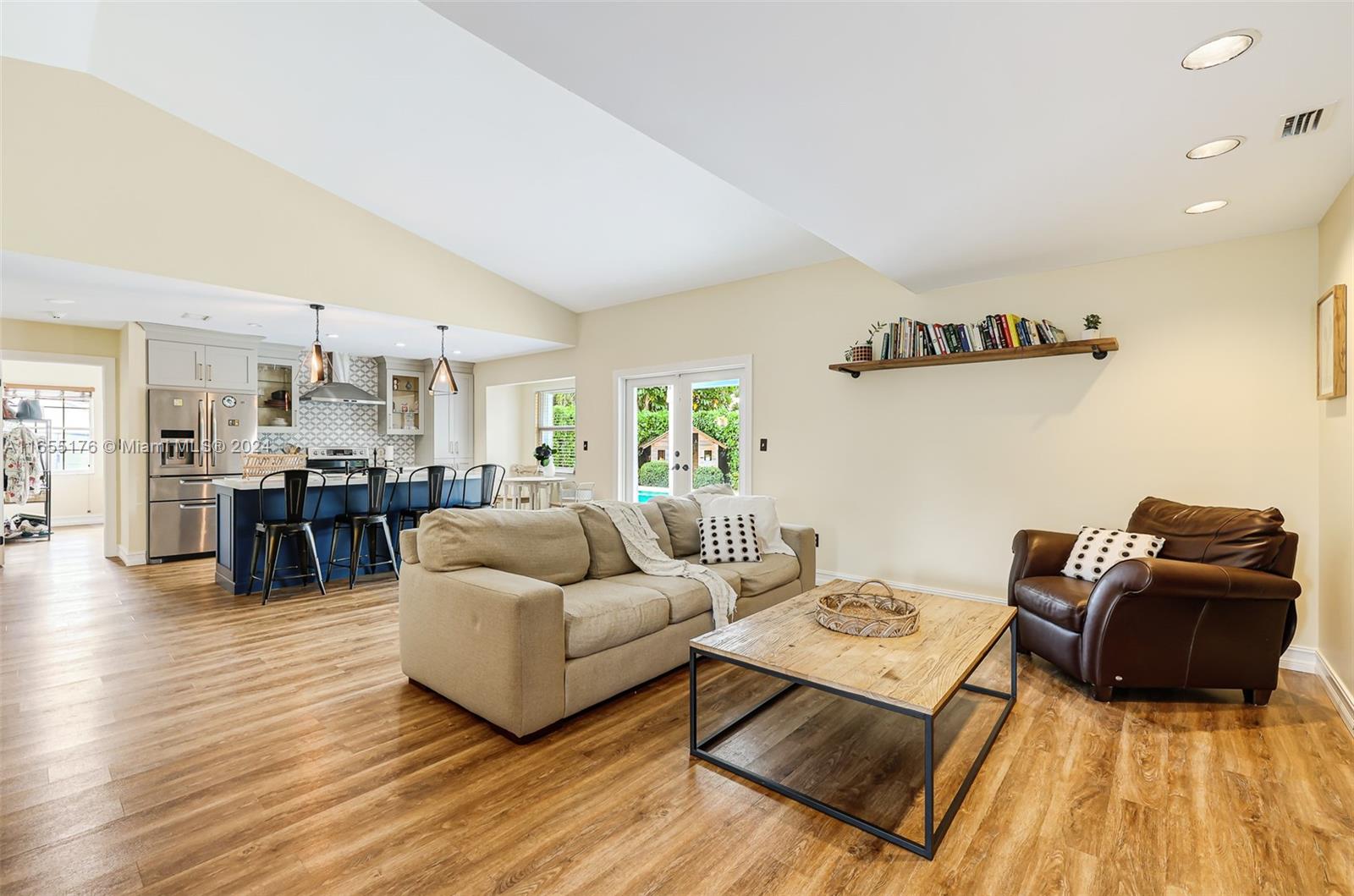 14871 Southwest 156th Street Miami, FL 33187 - Photo 17 of 84 a living room with furniture and wooden floor