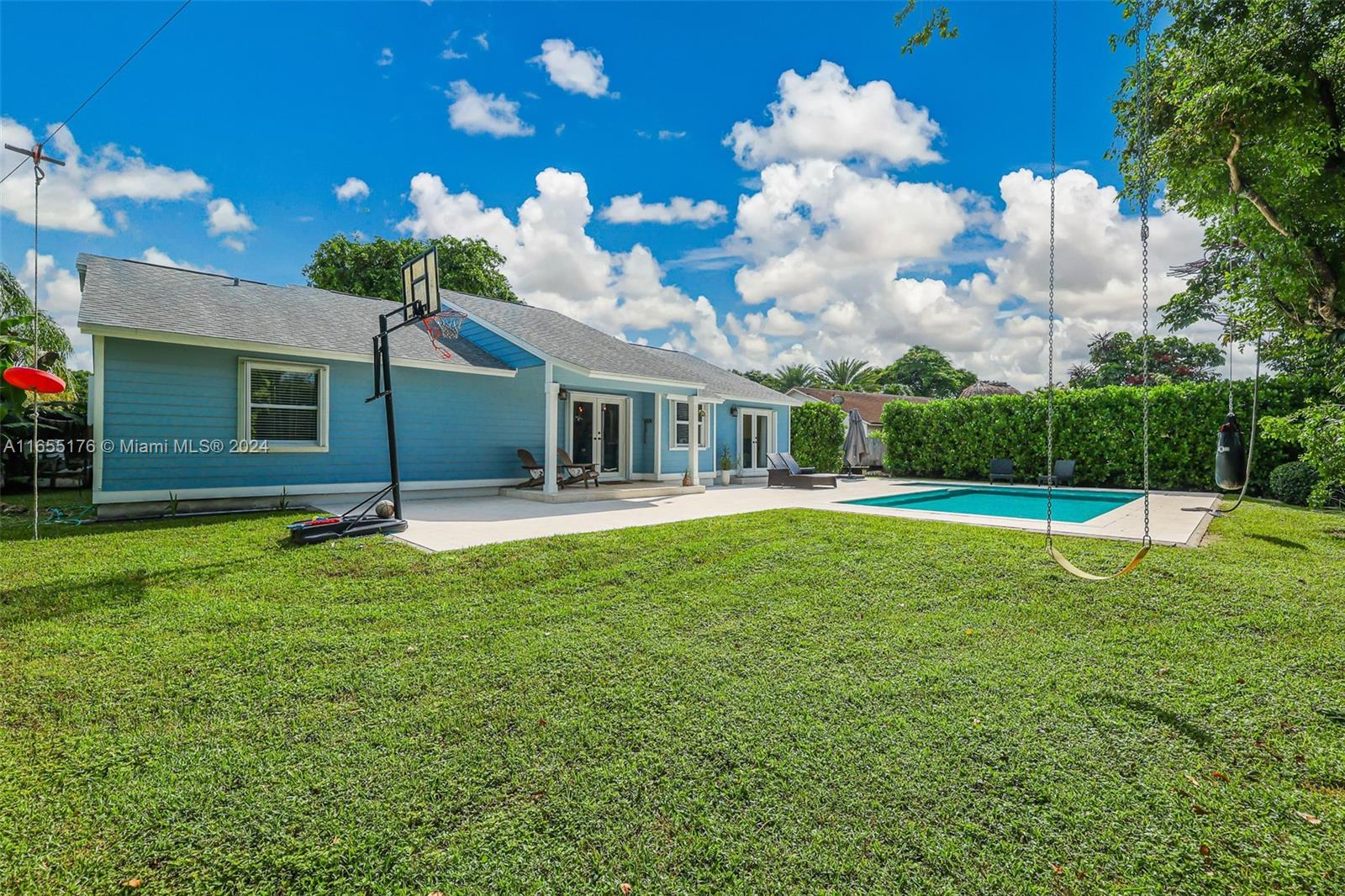 14871 Southwest 156th Street Miami, FL 33187 - Photo 53 of 84 a view of a house with a swimming pool