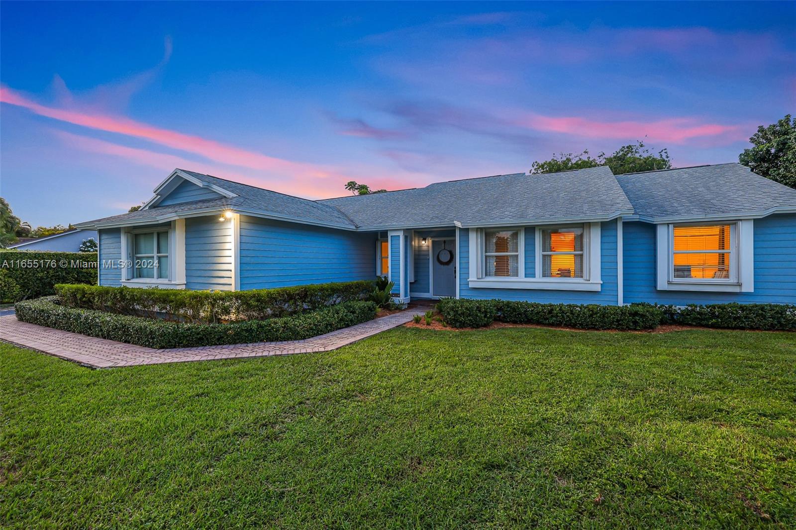 14871 Southwest 156th Street Miami, FL 33187 - Photo 69 of 84 a front view of a house with garden