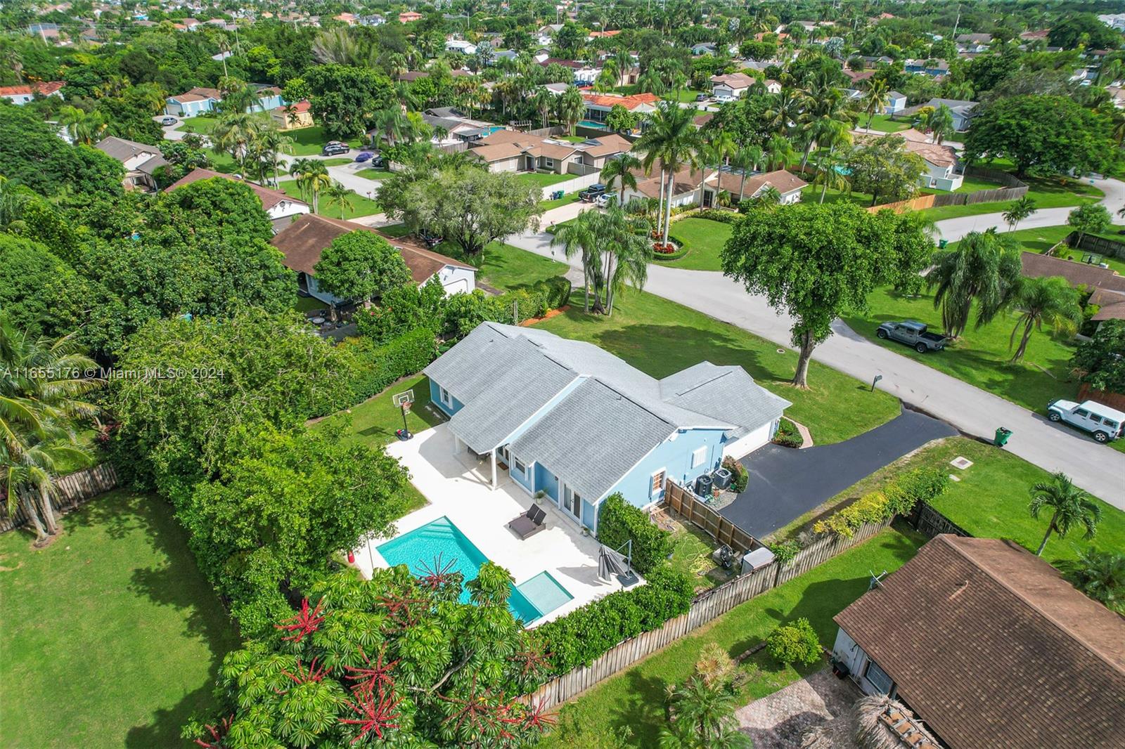 14871 Southwest 156th Street Miami, FL 33187 - Photo 74 of 84 an aerial view of a house with a yard