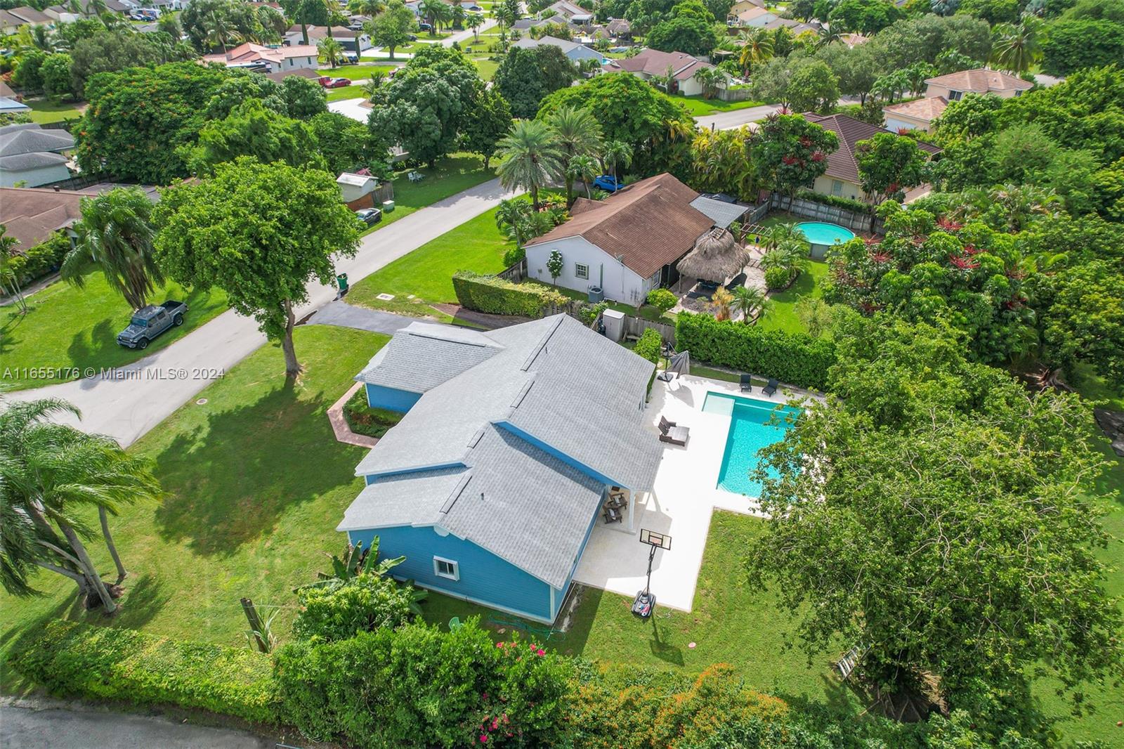 14871 Southwest 156th Street Miami, FL 33187 - Photo 76 of 84 an aerial view of a house with a garden