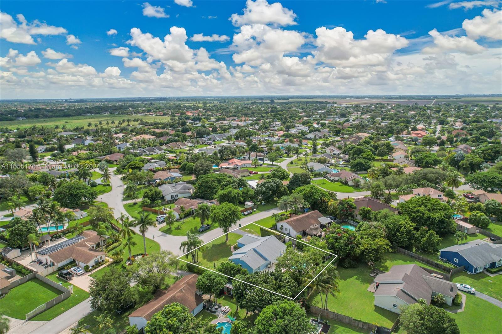 14871 Southwest 156th Street Miami, FL 33187 - Photo 79 of 84 an aerial view of residential building with green space