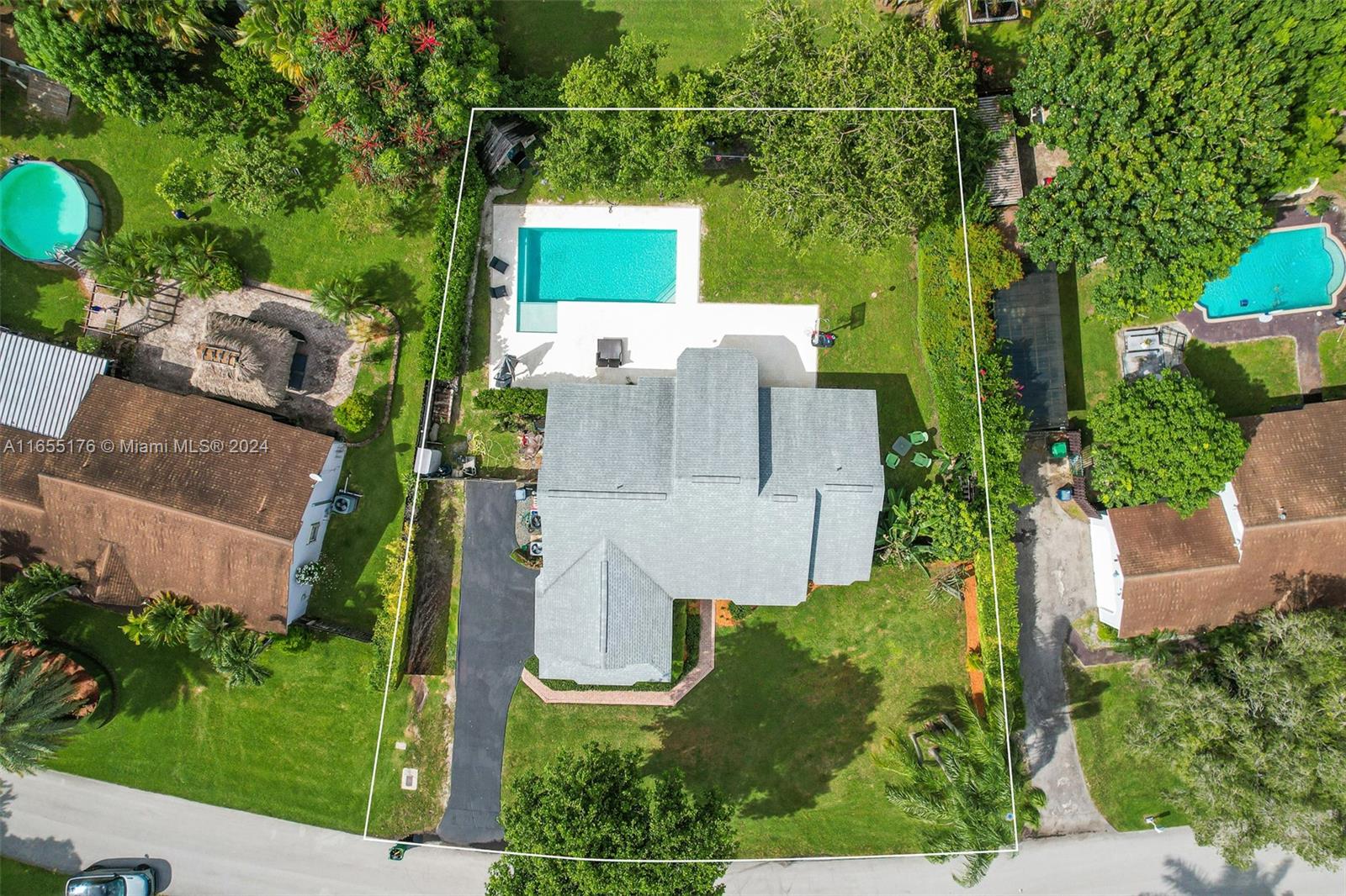 14871 Southwest 156th Street Miami, FL 33187 - Photo 83 of 84 an aerial view of a house with a yard
