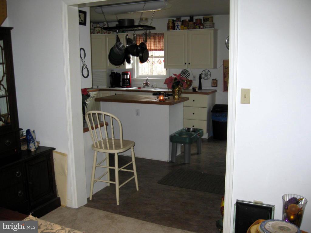 159 1/2 Wesley Road Quarryville, PA 17566 - Photo 13 of 43 a dining room with furniture and window
