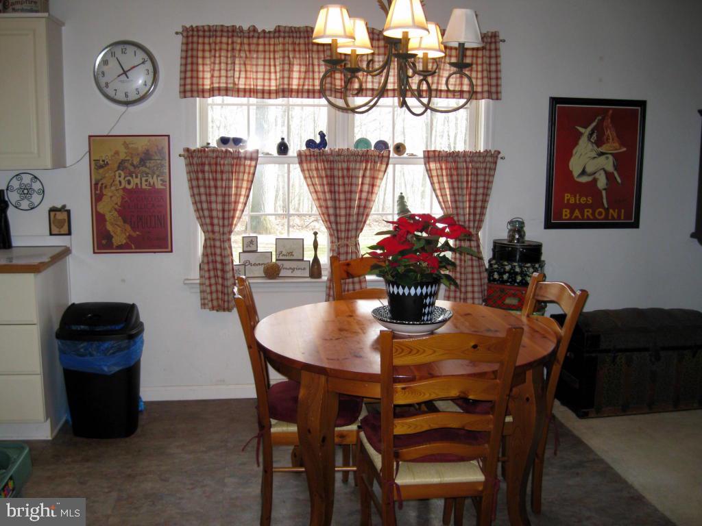 159 1/2 Wesley Road Quarryville, PA 17566 - Photo 17 of 43 a dining room with furniture and window