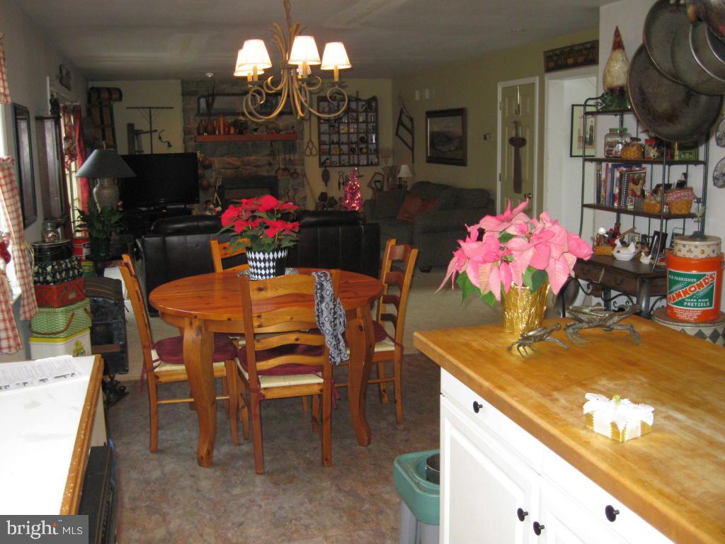 159 1/2 Wesley Road Quarryville, PA 17566 - Photo 18 of 43 a view of a dining room with furniture and chandelier