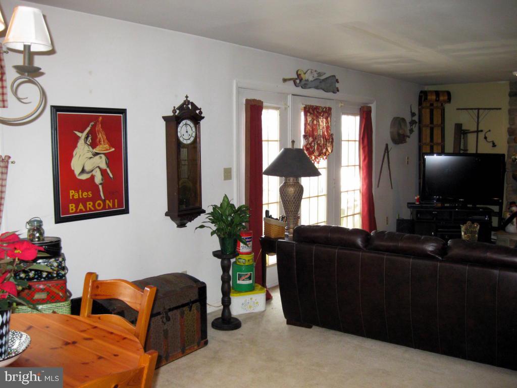 159 1/2 Wesley Road Quarryville, PA 17566 - Photo 19 of 43 a living room with furniture and a flat screen tv