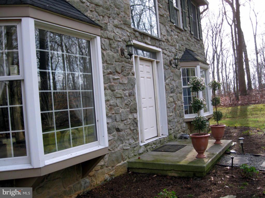 159 1/2 Wesley Road Quarryville, PA 17566 - Photo 3 of 43 a view of a house with backyard sitting area and porch