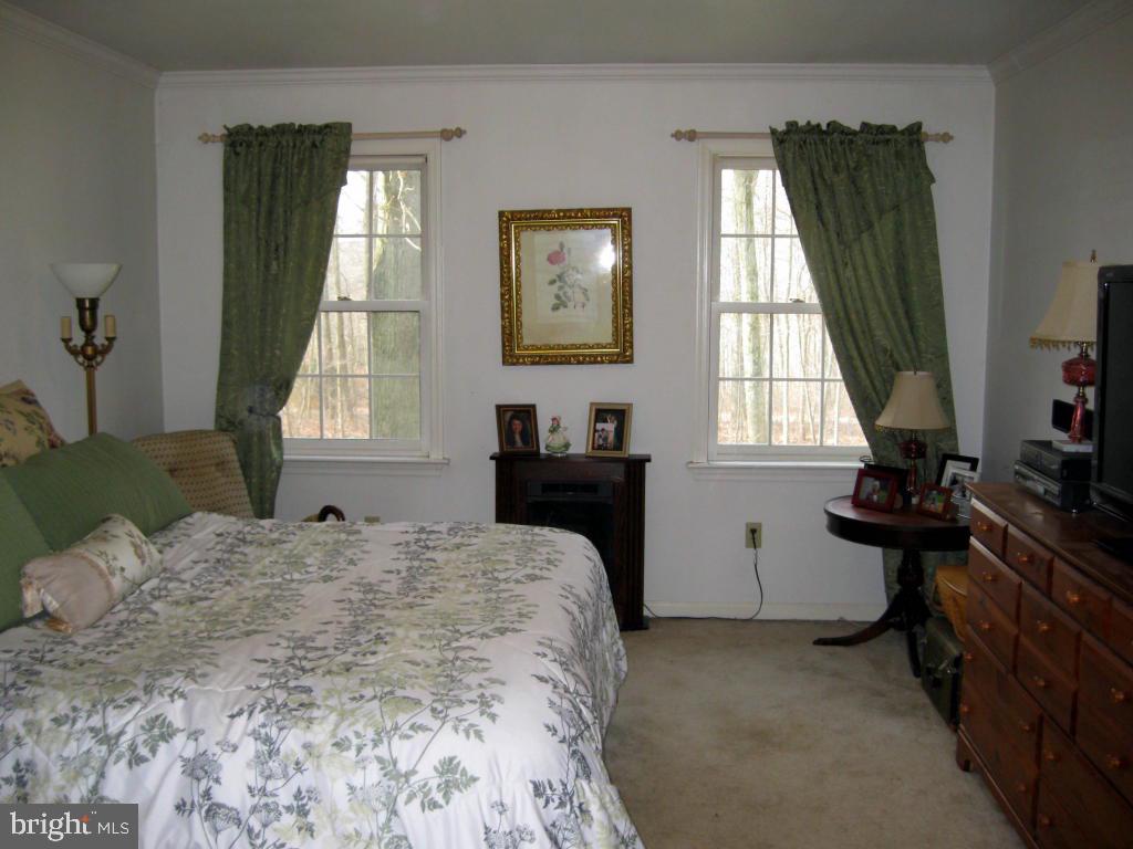159 1/2 Wesley Road Quarryville, PA 17566 - Photo 24 of 43 a bedroom with a bed and a window