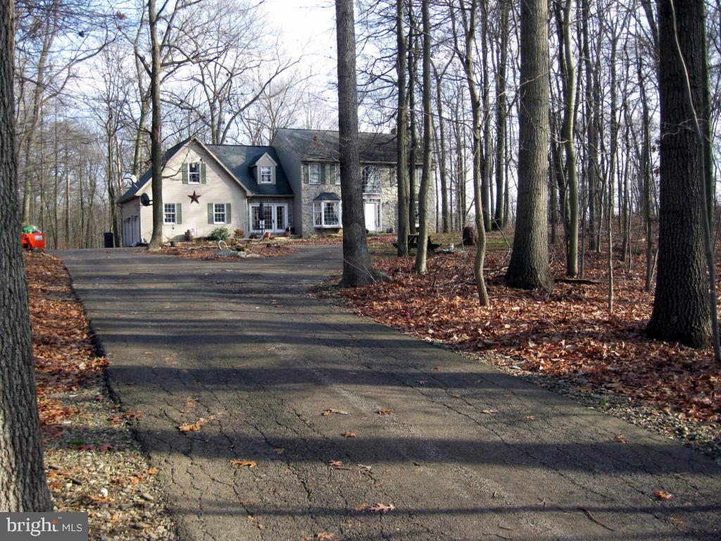 159 1/2 Wesley Road Quarryville, PA 17566 - Photo 4 of 43 a front view of a house